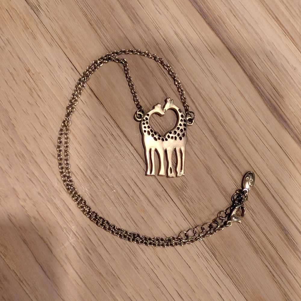 Gold Giraffe Pendant Necklace And Earrings
